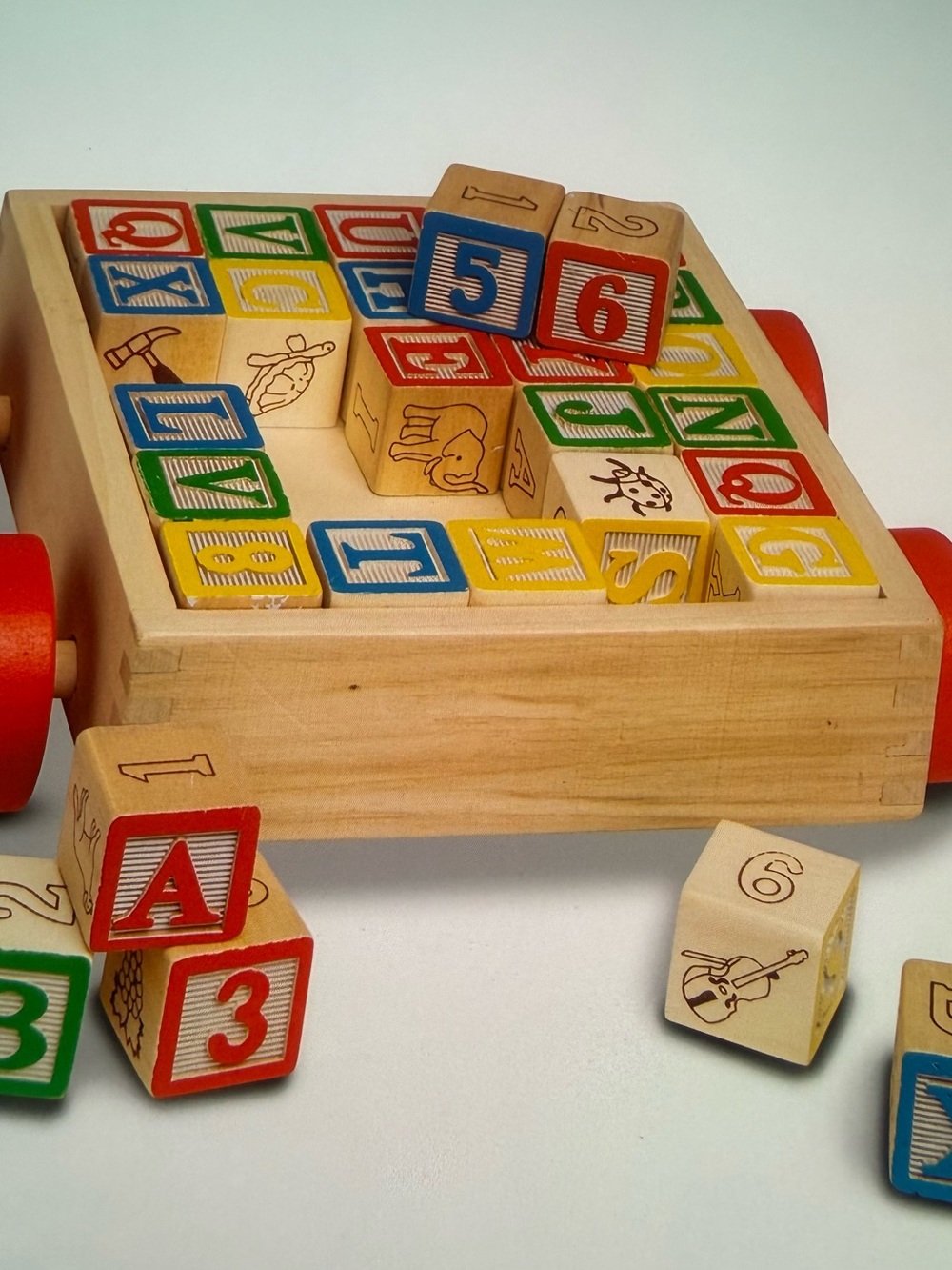 Wooden Alphabet & Number Pull Toy with Red, Blue, Green, Yellow Blocks